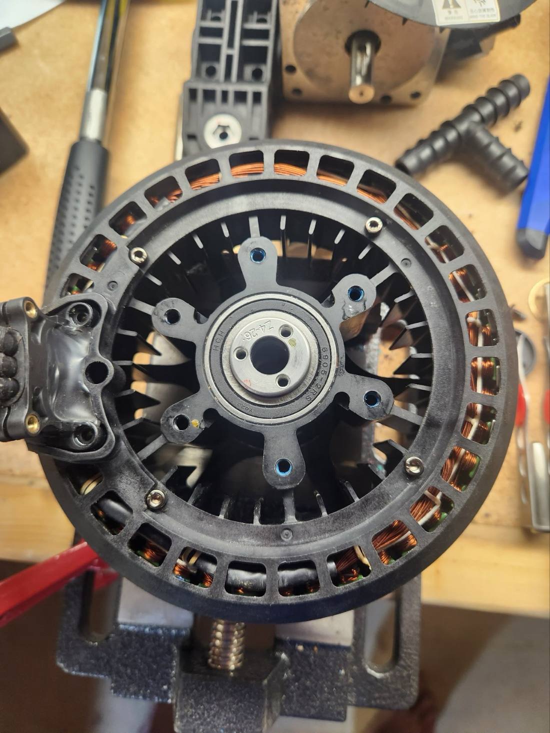 Motor stator teardown on the repair bench
