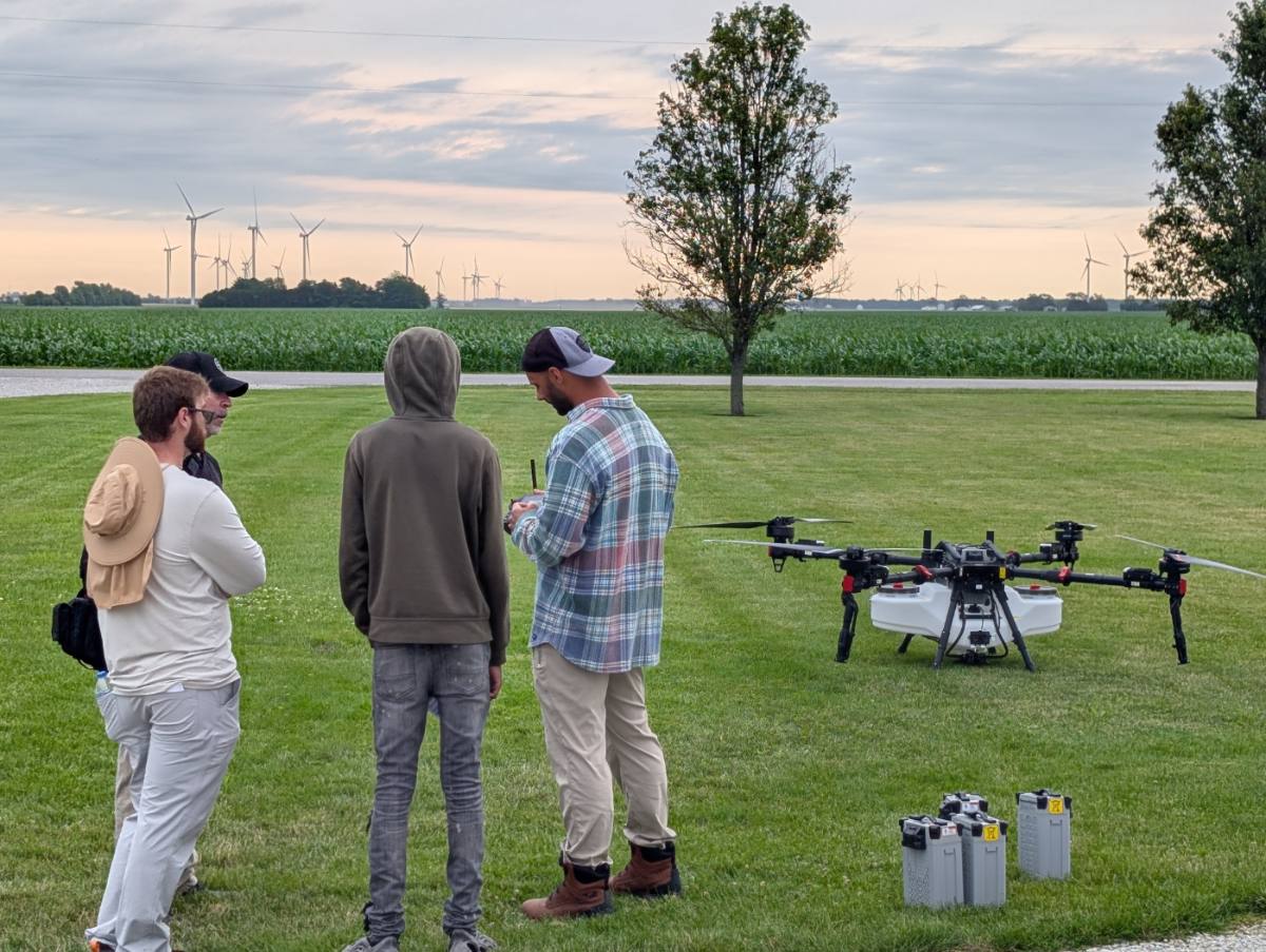Group training around an aircraft at dusk